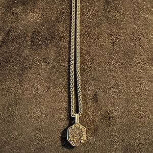 Sparkly black pendant with long gunmetal chain